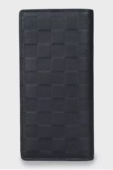 Men's wallet with branded embossed leather