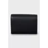 Leather wallet with gold logo and tag
