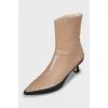 Leather ankle boots with accent sole