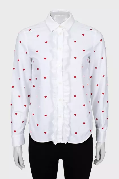 Fitted shirt decorated with embroidery