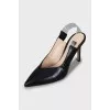 Black slingbacks with embossed leather