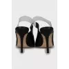 Black slingbacks with embossed leather