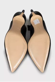 Black slingbacks with embossed leather