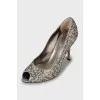 Stiletto heels decorated with rhinestones