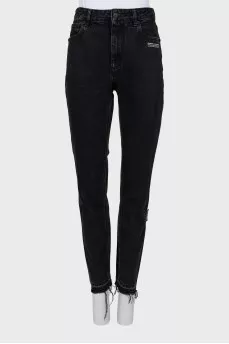 Black jeans with raw hem