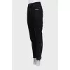Black jeans with raw hem