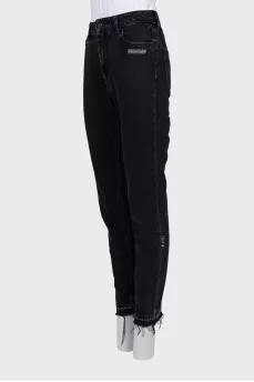 Black jeans with raw hem