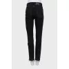 Black jeans with raw hem