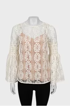 Guipure blouse with voluminous sleeves