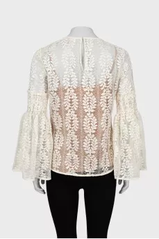 Guipure blouse with voluminous sleeves