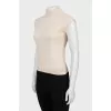 Knitted vest with a high neck
