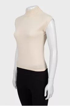 Knitted vest with a high neck