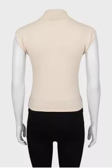 Knitted vest with a high neck