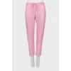 Tapered trousers in a combination stripe