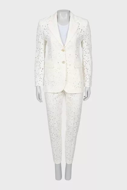 White suit with floral pattern