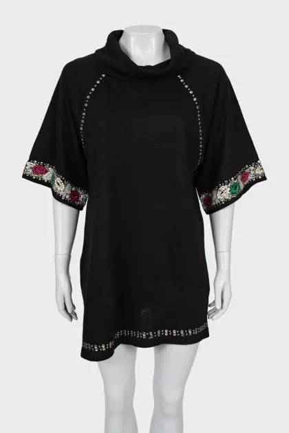 Sweater decorated with beads and embroidery