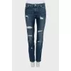 Blue jeans with a ripped effect