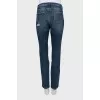 Blue jeans with a ripped effect