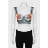 Top in a print decorated with lace
