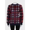 Long pile sweater with tag