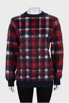 Long pile sweater with tag