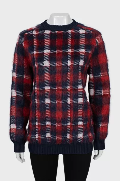 Long pile sweater with tag