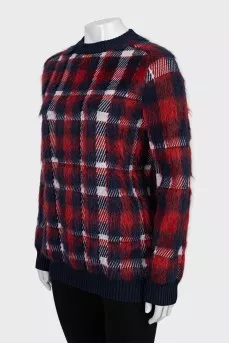 Long pile sweater with tag