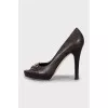 Leather shoes with embossed sole and tag