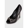 Leather shoes with embossed sole and tag