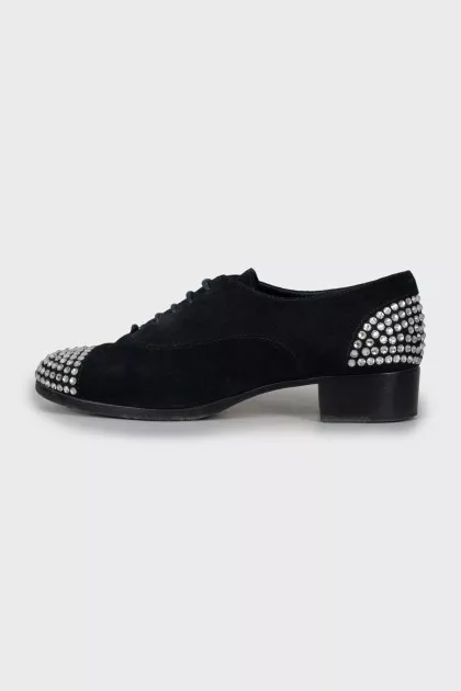 Suede shoes with rhinestones on the toes