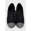 Suede shoes with rhinestones on the toes