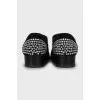 Suede shoes with rhinestones on the toes