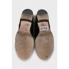 Suede shoes with rhinestones on the toes
