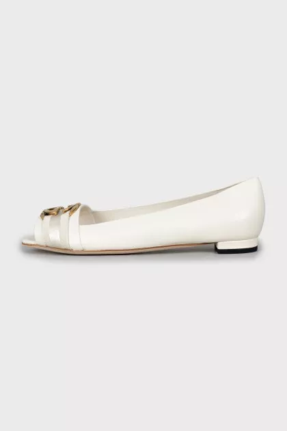 Leather ballet flats with gold logo, with tag