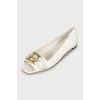 Leather ballet flats with gold logo, with tag