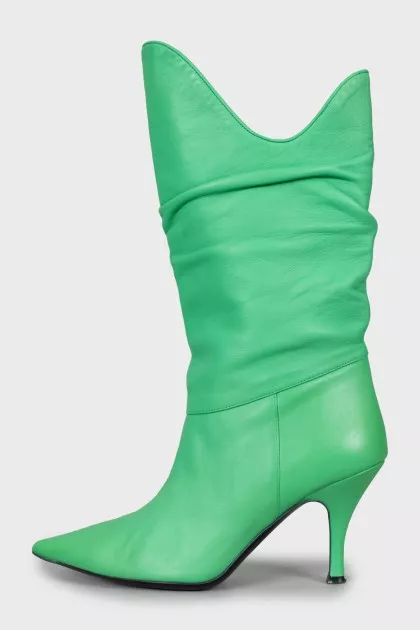 Leather boots with stiletto heels and pointed toe