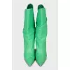 Leather boots with stiletto heels and pointed toe