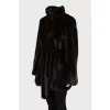 Loose-fitting fur coat with a belt