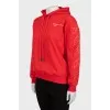 Red hoodie with print on sleeves