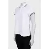 White polo shirt with patch