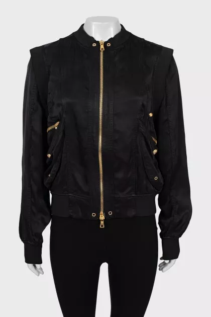 Black bomber jacket with golden zipper