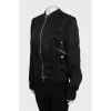 Black bomber jacket with golden zipper