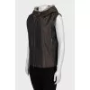 Fitted vest with fur on the hood