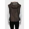 Fitted vest with fur on the hood