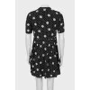 Dress with print decorated with a bow