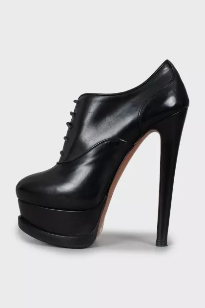Black leather lace-up ankle boots