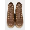 Insulated leather boots with decor