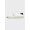 White leather sneakers with embroidered logo