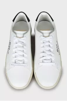 White leather sneakers with embroidered logo