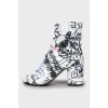 Tabi leather ankle boots with tag